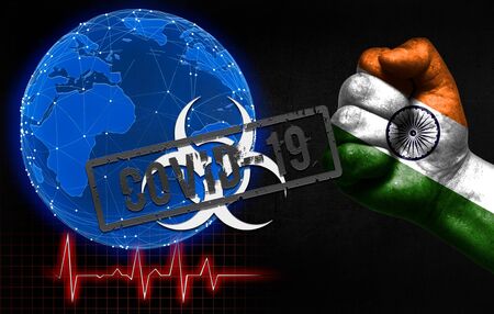 A new coronavirus disease called Covid-19 in India, with a male fist shown and a country flag. Coronavirus disease control concept in countries around the world.の写真素材