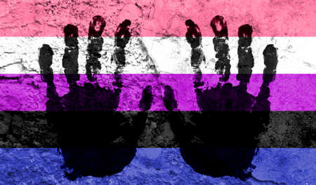 Handprints on the background of the flag of genderfluid. Freedom of choice, corruption, and...
