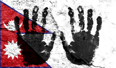 Handprints on the background of the flag of Nepal. Freedom of choice, corruption, and detention conceptの写真素材