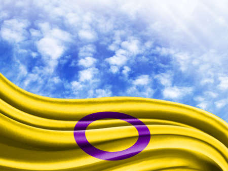 intersex pride flag against the sky, with place for text.の写真素材