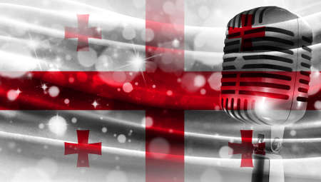Microphone on a background of a blurry flag Georgia close-up, a design concept for your layout with a good place for text and images.の写真素材