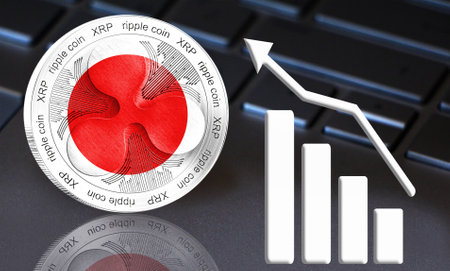Coin Ripple (XRP) with the flag of Japan depicted on it. In the background a keyboard, shown as a...