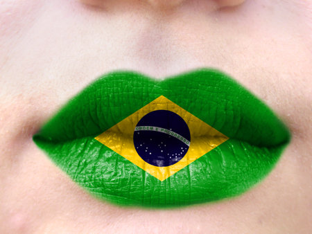 Female lips close up with a picture flag of Brazil. learning languages.の写真素材