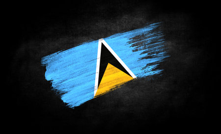 smear of paint in the form of the flag of Saint Lucia close-up on a black backgroundの写真素材