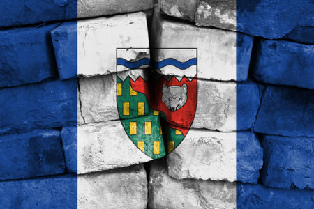 Northwest Territories flag painted on brick wallの写真素材