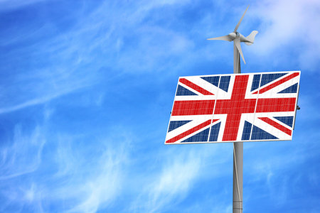 Solar panels against a blue sky with a picture of the flag of United Kingdom
