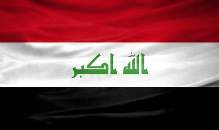 Realistic flag of Iraq on the wavy surface of fabric