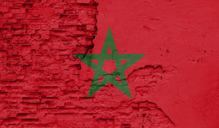 Morocco flag is painted onto an old brick wall