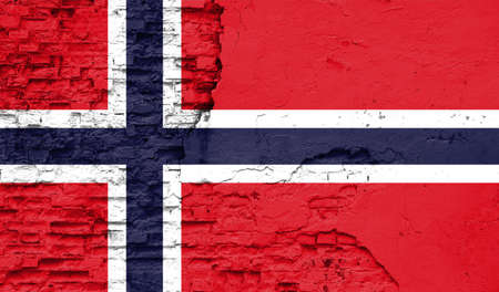 Norway flag is painted onto an old brick wallの写真素材