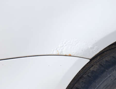 Rusty right wing covered with corrosive defect of ironの写真素材