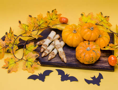 Halloween pumpkin and witch finger cookiesの写真素材