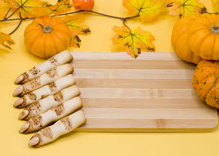 Halloween pumpkin and witch finger cookiesの写真素材
