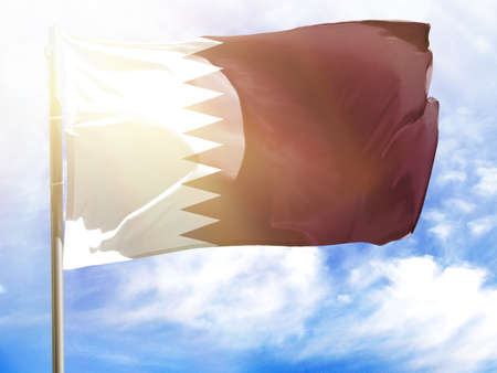 Flagpole with flag of Qatar