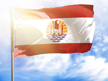 Flagpole with flag of French Polynesia.