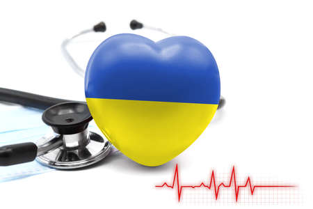 Flag of Ukraine in the form of a heart next to a stethoscope, the concept of the world health systemの写真素材