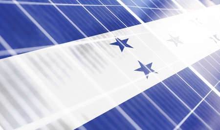 Solar panels on the background of the image of the flag of Honduras