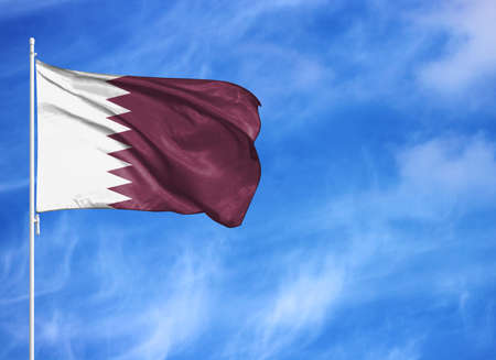 National flag of Qatar on a flagpoleの写真素材