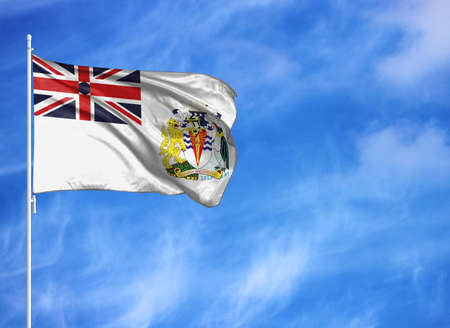 National flag of British Antarctic Territory on a flagpoleの写真素材