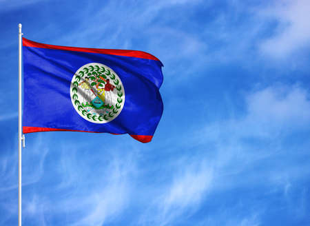 National flag of Belize on a flagpoleの写真素材