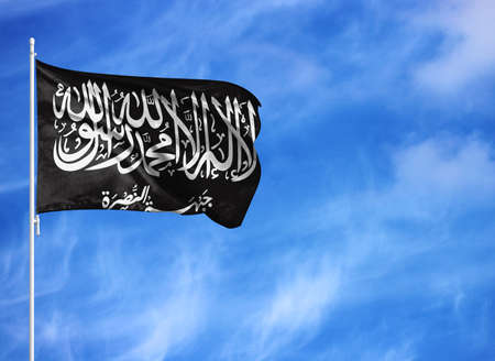 National flag of Al Nusra Front on a flagpoleの写真素材