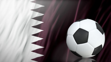 Soccer ball on the background of the flag of Qatarの写真素材