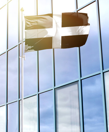 Flag of St Piran on a flagpole