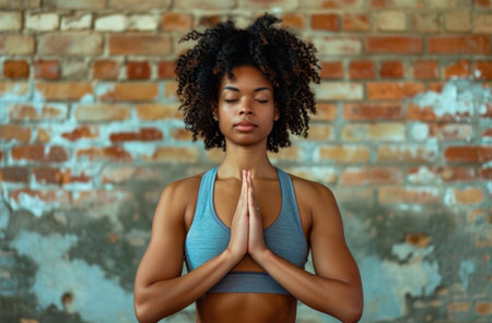 Sporty young woman doing yoga practice. AI generated.の素材