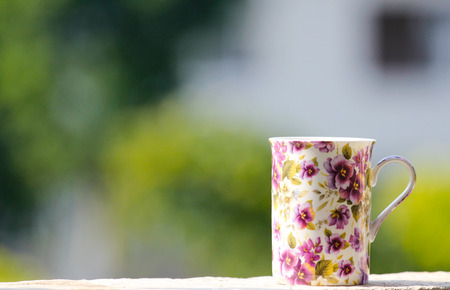 Purple cup on the window sillの写真素材