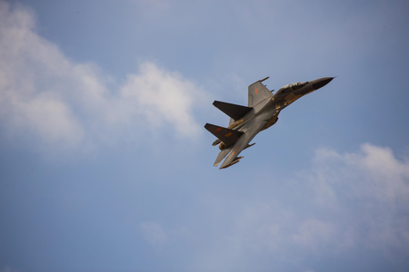 fighter jet flying in the blue skyのeditorial素材