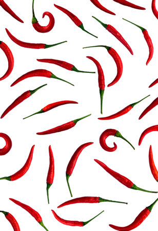 Background of red chili peppers on whiteの写真素材