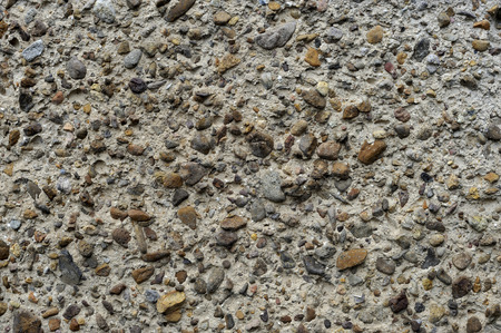 Small stones and clay barrier wall.の写真素材