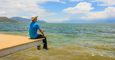 man enjoy the sea viewのeditorial素材