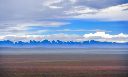 the snow capped mountainsの写真素材