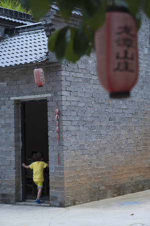 Red Lantern hanging outside of an ancient buildingのeditorial素材
