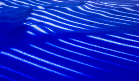 blue line on a ground covered with snowの写真素材