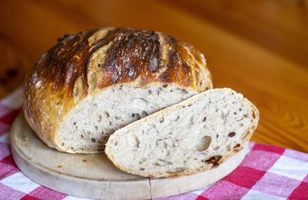 loaf of bread on wooden table