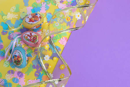 Easter order with eggs and ribbon in matching colors and motifs that can also be used as a greeting...