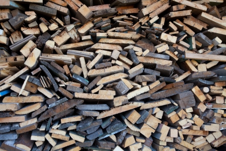 rustless firewood stacked in the woodpileの写真素材