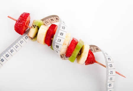 Fruit on a stick to a healthy dietの写真素材