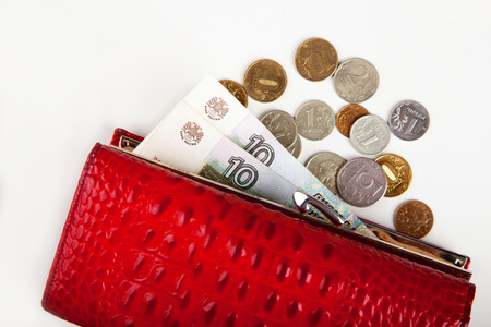 wallet with coins will rubles on a whiteの写真素材