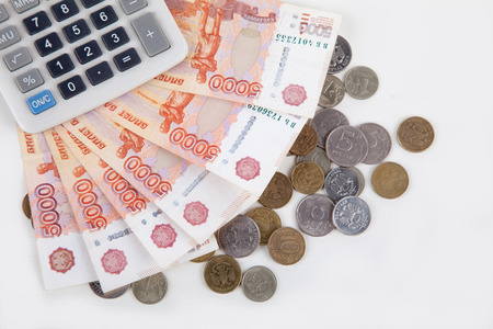 Russian money and calculator on white backgroundの写真素材