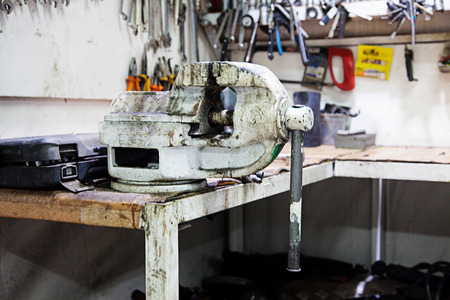 workbench with old tools in the garageの写真素材