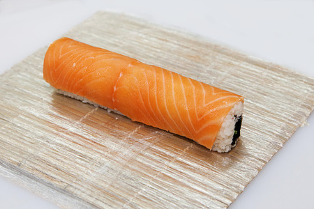 the process of preparing sushi Philadelphia on the tableの写真素材