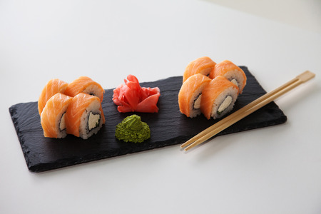 Philadelphia sushi with salmon on a stoneの写真素材