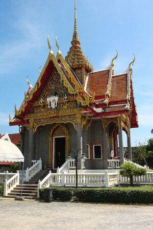 Beautiful carved gilded Buddhist pagoda at Wat Chalong Temple. Religion. Thailand. Journey. Travels.の写真素材