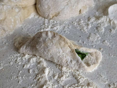 Blinded raw pie with sorrel. Instructions, step 4. Mobile photoの写真素材