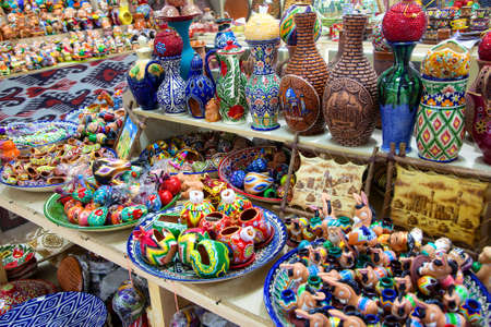 Handmade ceramic vases with national ornament and other souvenirs of uzbekistan in the store. Traditional art. 29 april 2019.のeditorial素材