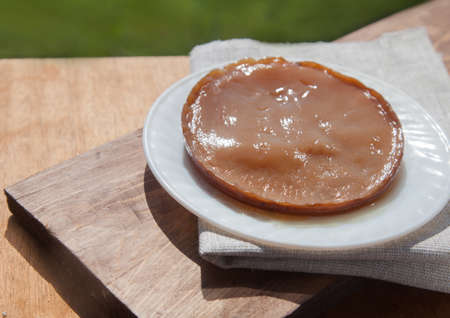 Tea goib lies on a white plate in the garden. Healthy food concept