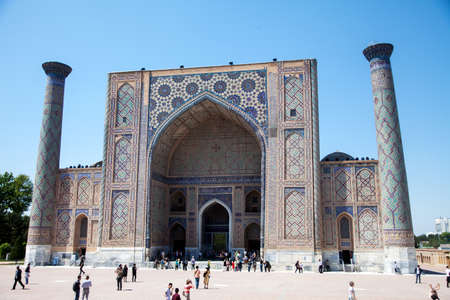 Ulugbek madrasah decorated with mosaics on Registan Square in Samarkand in Uzbekistan. 04/29/2019のeditorial素材