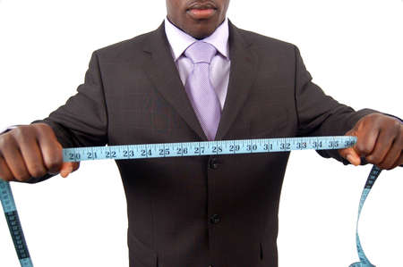 This is an image of a man with a measuring tape.の写真素材